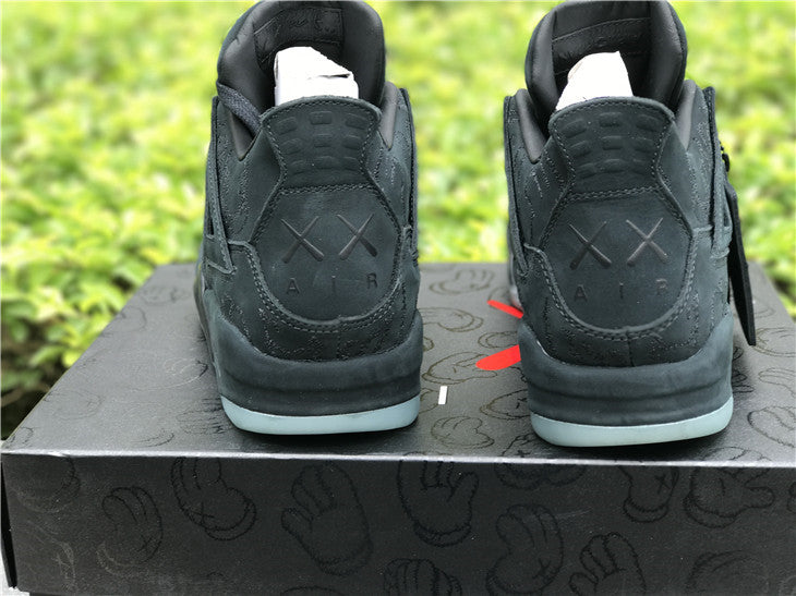 Jordan 4 Kaws - Black